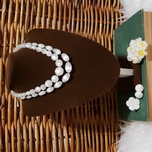 Mixed Jewelry Lot Includes: broach, earrings, ring, and 2 necklaces.